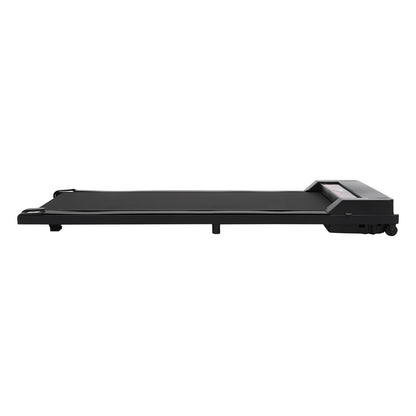 Tapis roulant compact noir posé au sol, design minimaliste et moderne.